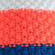 Knitted beanie POM blue/orange