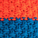 Adīta cepure POM orange/blue